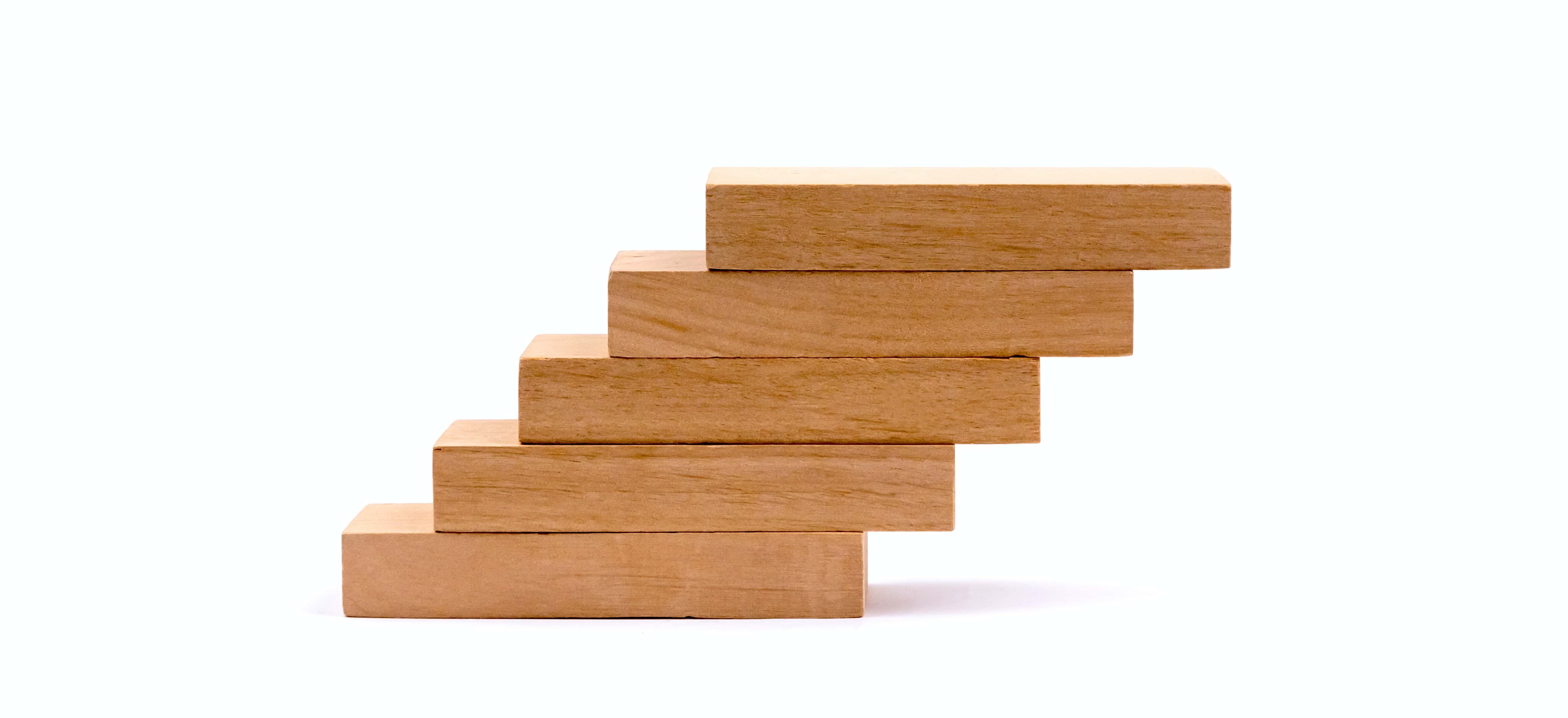 wooden blocks stacked up and right in a graph formation
